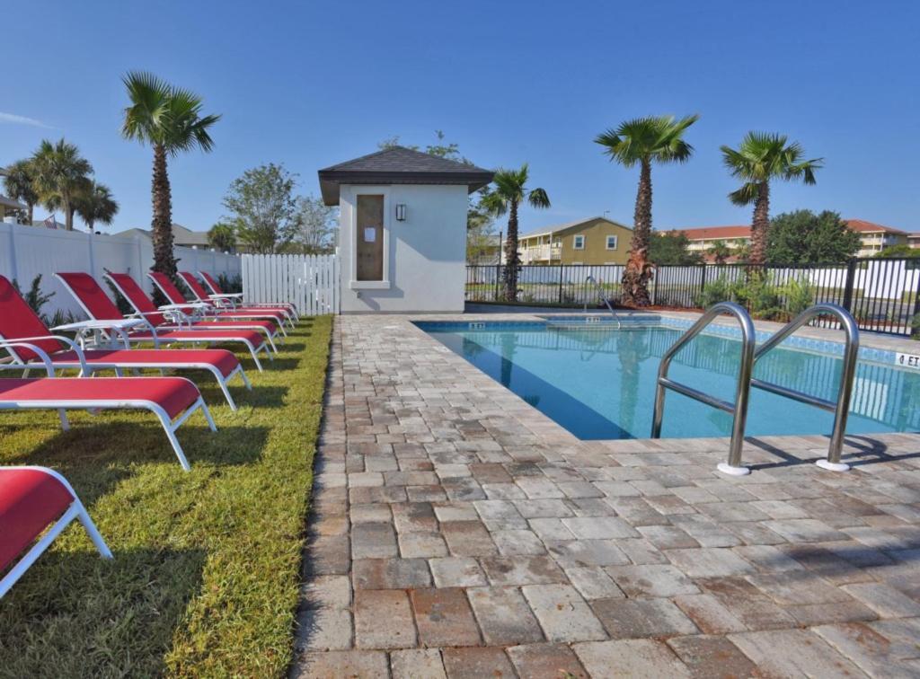 Holiday home Sandy Buns Chateau With Golf Cart And Heated Pool
